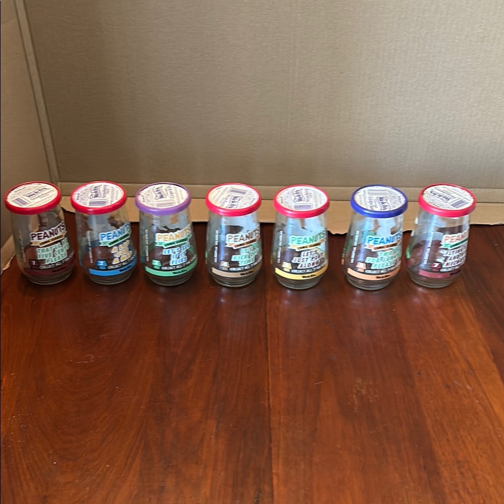 1998 Complete set of Peanuts Welch’s Jelly Jars 1-7with lids